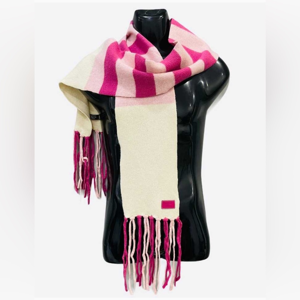 Coach wool scarf. Slightly strained from being washed (by pink tag)